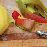 Step 1 - Peel skin off mangos