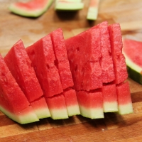Step 2 - Slice a quarter of the melon into 1/4 - 3/8 inch-strips